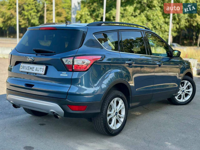 Синій Форд Ескейп, об'ємом двигуна 1.5 л та пробігом 150 тис. км за 12699 $, фото 4 на Automoto.ua