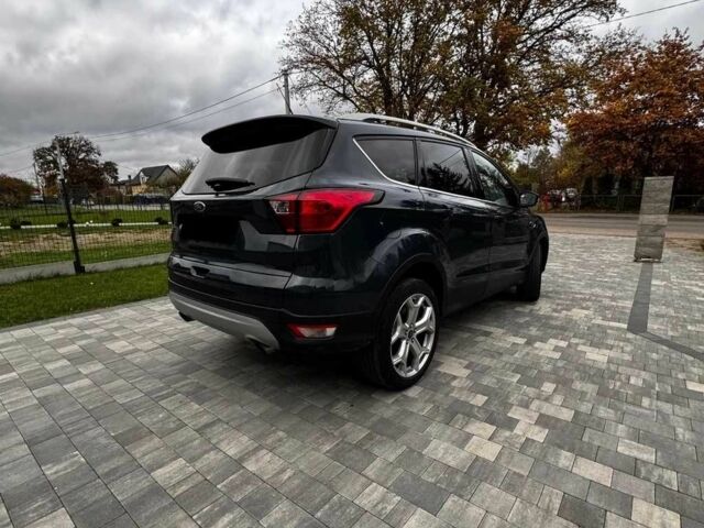 Синий Форд Эскейп, объемом двигателя 2 л и пробегом 93 тыс. км за 9800 $, фото 4 на Automoto.ua