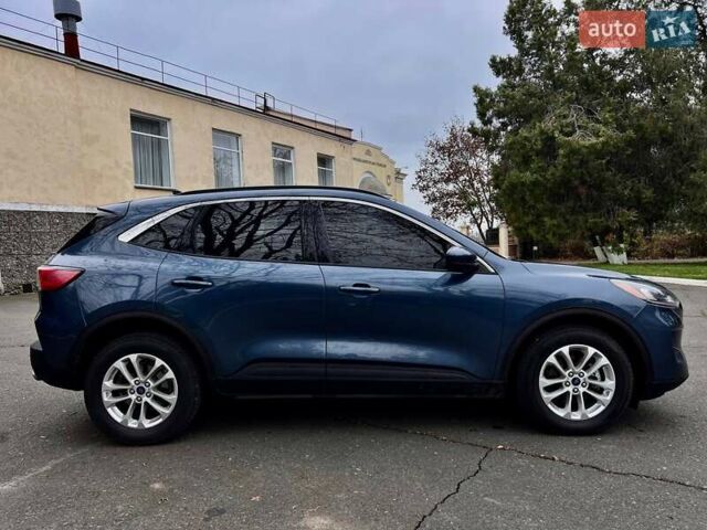 Синій Форд Ескейп, об'ємом двигуна 2 л та пробігом 139 тис. км за 19800 $, фото 4 на Automoto.ua