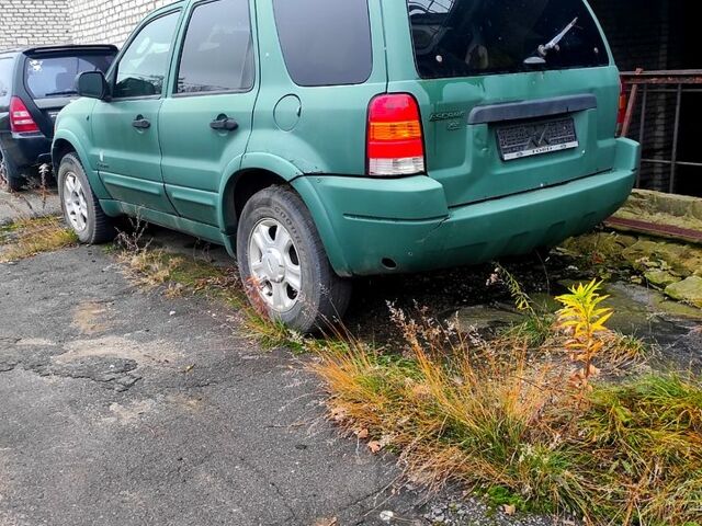 Зеленый Форд Эскейп, объемом двигателя 3 л и пробегом 300 тыс. км за 2300 $, фото 2 на Automoto.ua