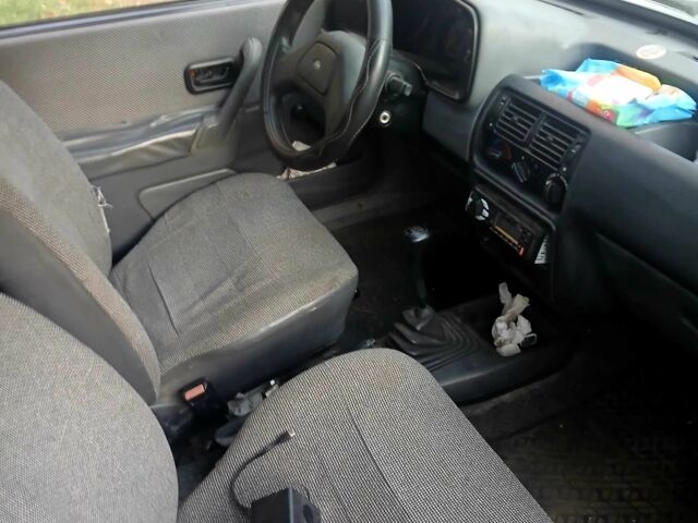 Белый Форд Эскорт, объемом двигателя 1.3 л и пробегом 3 тыс. км за 861 $, фото 1 на Automoto.ua