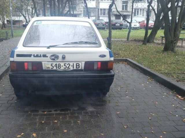 Белый Форд Эскорт, объемом двигателя 1.4 л и пробегом 89 тыс. км за 900 $, фото 2 на Automoto.ua
