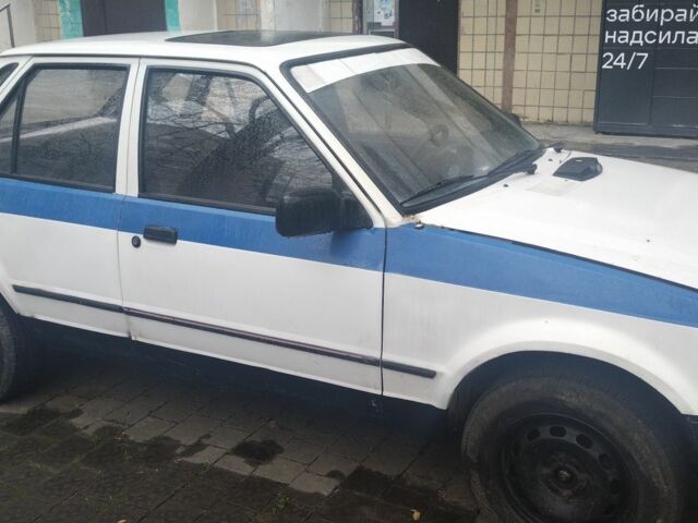 Белый Форд Эскорт, объемом двигателя 1.4 л и пробегом 89 тыс. км за 900 $, фото 1 на Automoto.ua