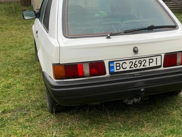 Белый Форд Эскорт, объемом двигателя 1.3 л и пробегом 77 тыс. км за 800 $, фото 5 на Automoto.ua