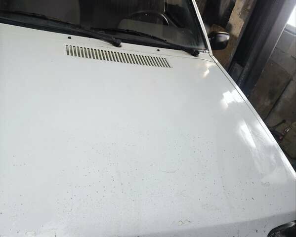 Белый Форд Эскорт, объемом двигателя 1.6 л и пробегом 150 тыс. км за 750 $, фото 4 на Automoto.ua