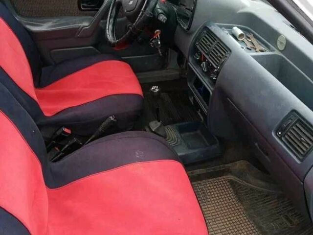 Белый Форд Эскорт, объемом двигателя 1.3 л и пробегом 45 тыс. км за 550 $, фото 3 на Automoto.ua