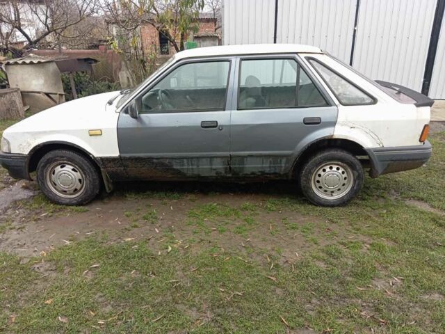 Белый Форд Эскорт, объемом двигателя 1.3 л и пробегом 123 тыс. км за 299 $, фото 2 на Automoto.ua