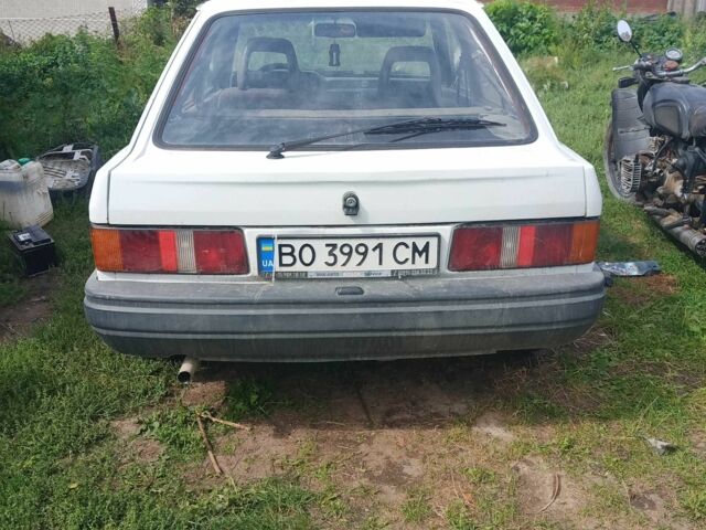 Белый Форд Эскорт, объемом двигателя 1.3 л и пробегом 45 тыс. км за 650 $, фото 1 на Automoto.ua