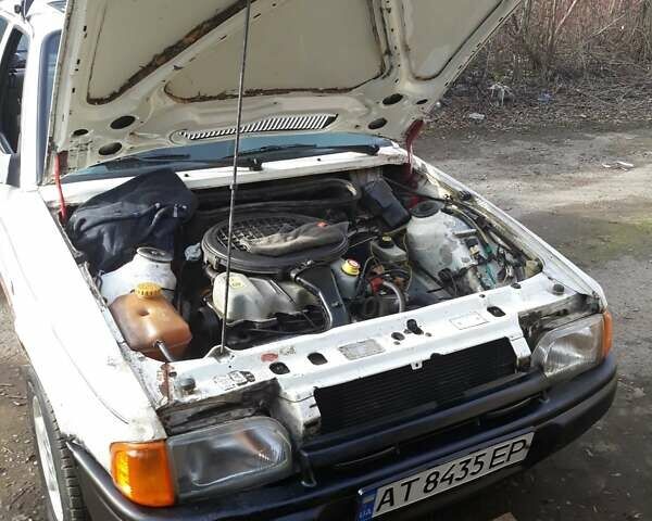 Белый Форд Эскорт, объемом двигателя 1.4 л и пробегом 400 тыс. км за 591 $, фото 6 на Automoto.ua