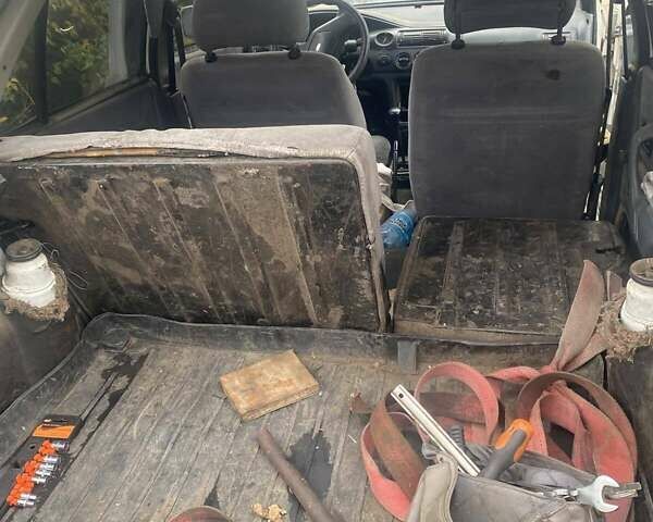 Белый Форд Эскорт, объемом двигателя 1.8 л и пробегом 370 тыс. км за 500 $, фото 3 на Automoto.ua