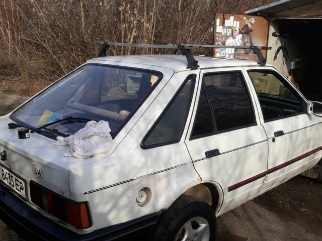 Белый Форд Эскорт, объемом двигателя 1.4 л и пробегом 400 тыс. км за 591 $, фото 2 на Automoto.ua