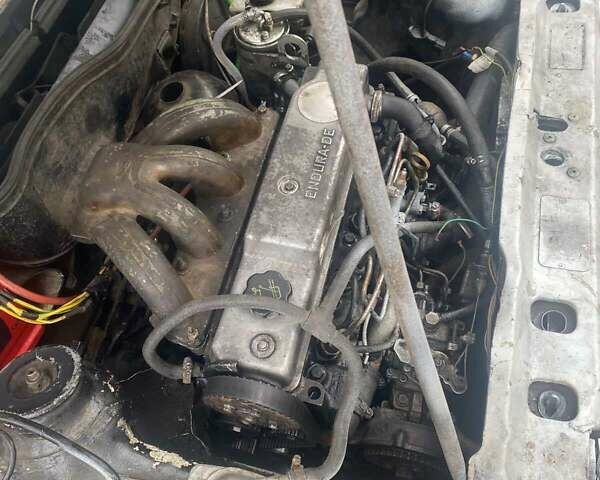 Белый Форд Эскорт, объемом двигателя 1.8 л и пробегом 370 тыс. км за 500 $, фото 2 на Automoto.ua