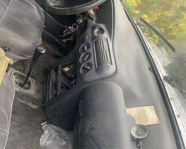 Белый Форд Эскорт, объемом двигателя 1.8 л и пробегом 370 тыс. км за 500 $, фото 6 на Automoto.ua