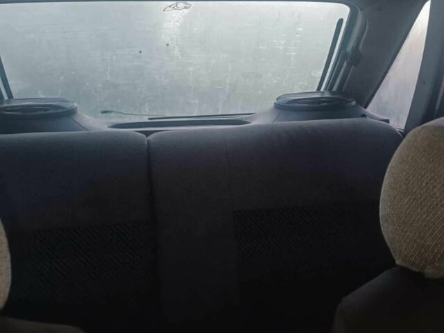 Білий Форд Ескорт, об'ємом двигуна 1.4 л та пробігом 43 тис. км за 750 $, фото 1 на Automoto.ua