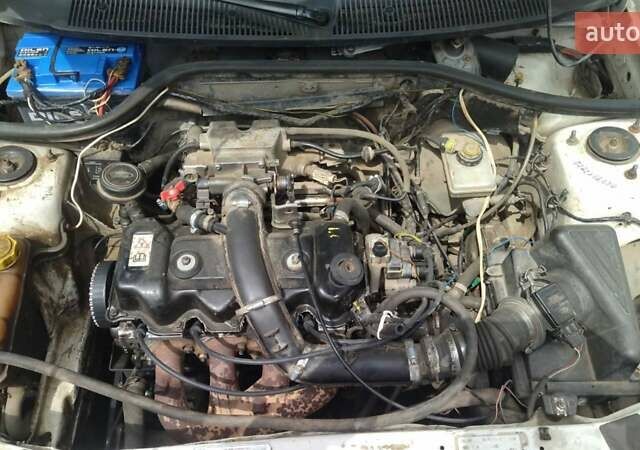 Белый Форд Эскорт, объемом двигателя 1.39 л и пробегом 100 тыс. км за 1000 $, фото 7 на Automoto.ua