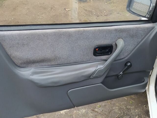 Белый Форд Эскорт, объемом двигателя 1.6 л и пробегом 300 тыс. км за 343 $, фото 12 на Automoto.ua