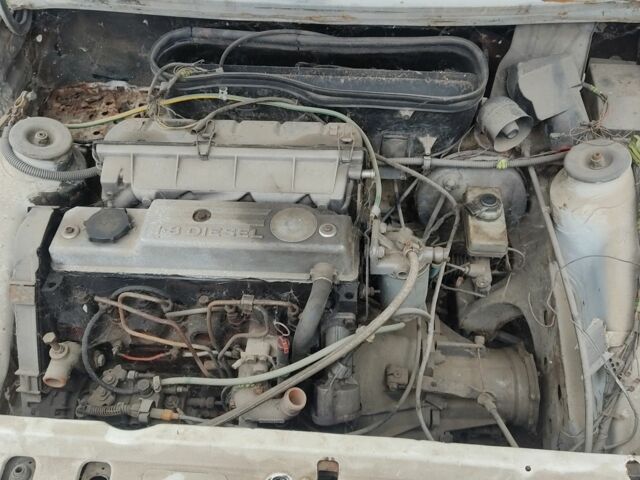 Білий Форд Ескорт, об'ємом двигуна 1.6 л та пробігом 12 тис. км за 238 $, фото 4 на Automoto.ua