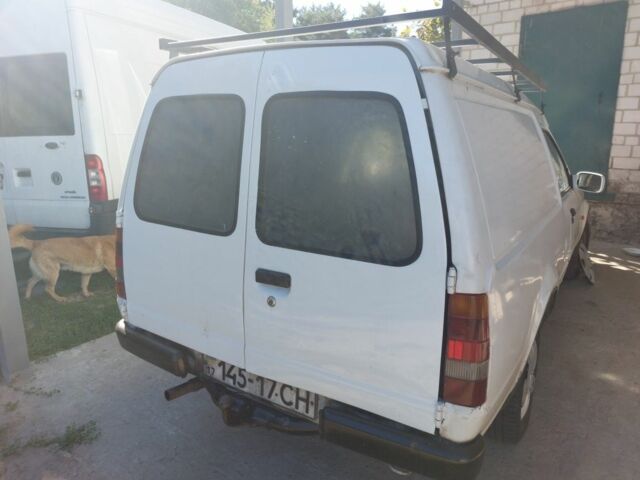 Белый Форд Эскорт, объемом двигателя 1 л и пробегом 300 тыс. км за 1500 $, фото 1 на Automoto.ua