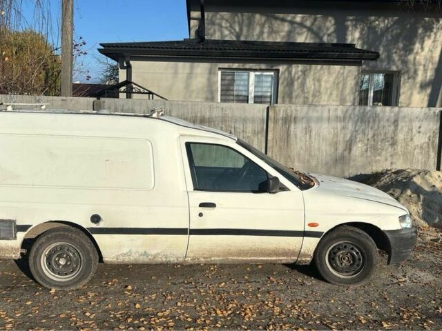 Белый Форд Эскорт, объемом двигателя 1.3 л и пробегом 150 тыс. км за 300 $, фото 1 на Automoto.ua