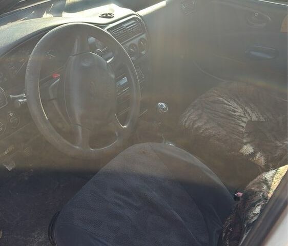 Белый Форд Эскорт, объемом двигателя 1.3 л и пробегом 150 тыс. км за 300 $, фото 4 на Automoto.ua