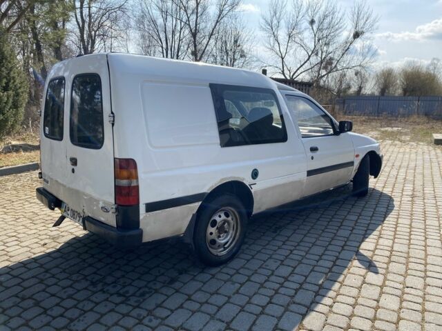 Білий Форд Ескорт, об'ємом двигуна 1.8 л та пробігом 300 тис. км за 699 $, фото 2 на Automoto.ua