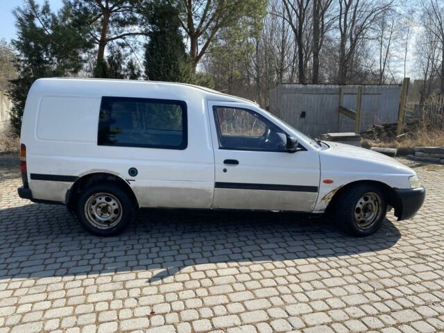 Білий Форд Ескорт, об'ємом двигуна 1.8 л та пробігом 300 тис. км за 699 $, фото 1 на Automoto.ua