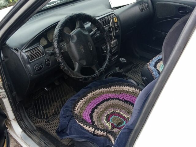 Белый Форд Эскорт, объемом двигателя 1.8 л и пробегом 3 тыс. км за 1300 $, фото 5 на Automoto.ua