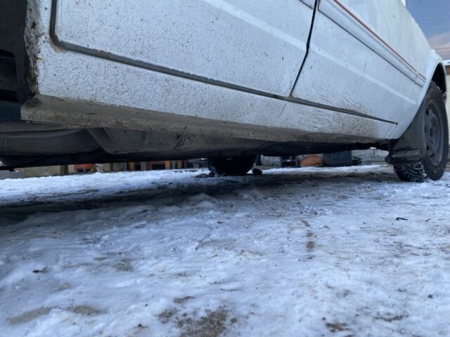 Белый Форд Эскорт, объемом двигателя 1.4 л и пробегом 300 тыс. км за 400 $, фото 5 на Automoto.ua