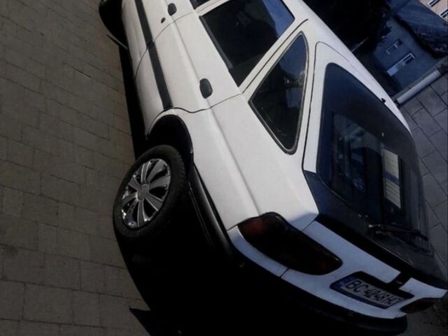 Білий Форд Ескорт, об'ємом двигуна 1.3 л та пробігом 200 тис. км за 946 $, фото 3 на Automoto.ua