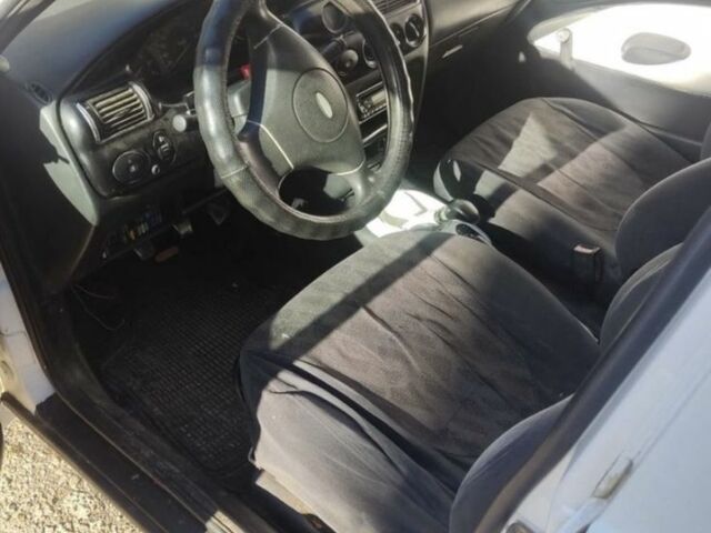 Білий Форд Ескорт, об'ємом двигуна 1.3 л та пробігом 200 тис. км за 946 $, фото 4 на Automoto.ua