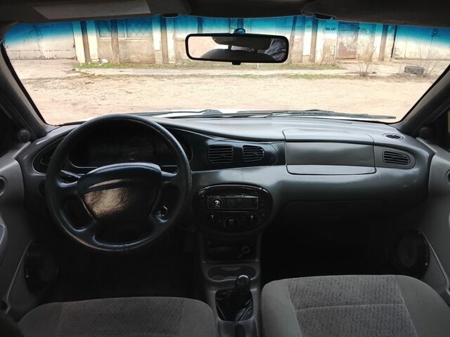 Білий Форд Ескорт, об'ємом двигуна 2 л та пробігом 278 тис. км за 1016 $, фото 2 на Automoto.ua