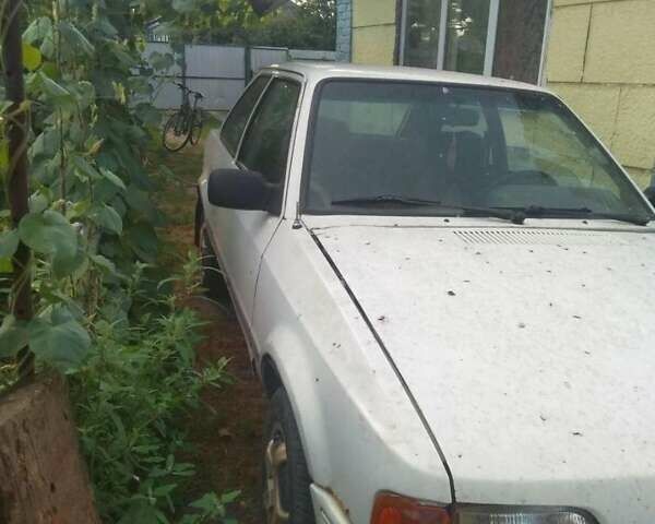 Белый Форд Эскорт, объемом двигателя 0 л и пробегом 100 тыс. км за 600 $, фото 2 на Automoto.ua