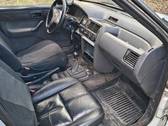 Белый Форд Эскорт, объемом двигателя 1.4 л и пробегом 460 тыс. км за 1250 $, фото 6 на Automoto.ua