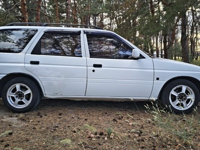 Белый Форд Эскорт, объемом двигателя 1.4 л и пробегом 460 тыс. км за 1250 $, фото 2 на Automoto.ua