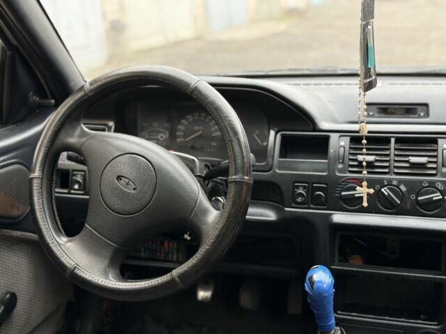 Білий Форд Ескорт, об'ємом двигуна 1.4 л та пробігом 250 тис. км за 750 $, фото 8 на Automoto.ua