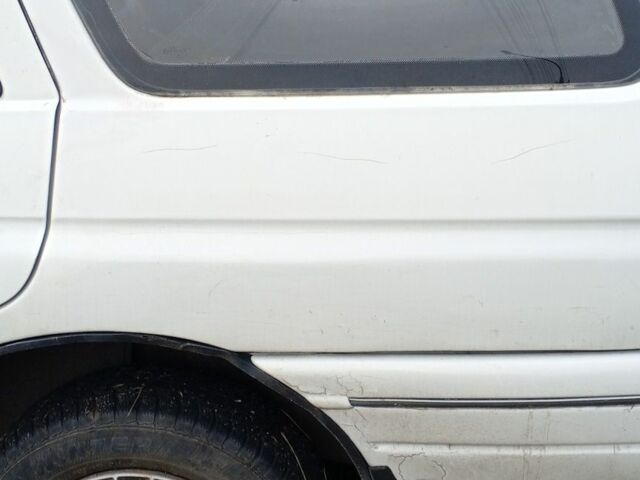 Белый Форд Эскорт, объемом двигателя 1.8 л и пробегом 250 тыс. км за 1500 $, фото 5 на Automoto.ua