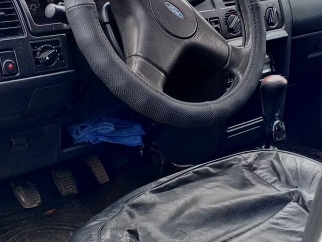 Белый Форд Эскорт, объемом двигателя 1.8 л и пробегом 250 тыс. км за 1500 $, фото 6 на Automoto.ua