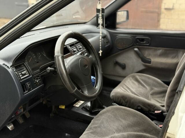 Білий Форд Ескорт, об'ємом двигуна 1.4 л та пробігом 250 тис. км за 750 $, фото 7 на Automoto.ua