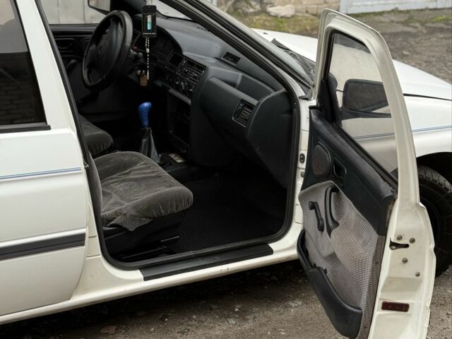 Білий Форд Ескорт, об'ємом двигуна 1.4 л та пробігом 250 тис. км за 750 $, фото 14 на Automoto.ua