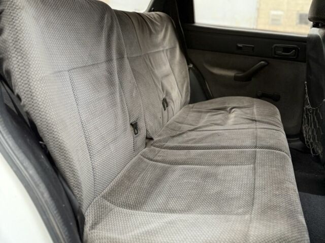 Білий Форд Ескорт, об'ємом двигуна 1.4 л та пробігом 250 тис. км за 750 $, фото 11 на Automoto.ua