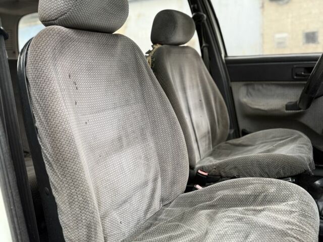 Білий Форд Ескорт, об'ємом двигуна 1.4 л та пробігом 250 тис. км за 750 $, фото 10 на Automoto.ua