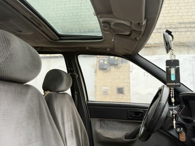 Білий Форд Ескорт, об'ємом двигуна 1.4 л та пробігом 250 тис. км за 750 $, фото 12 на Automoto.ua