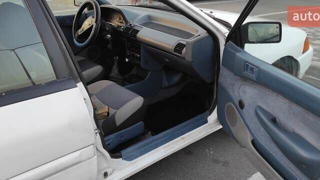 Белый Форд Эскорт, объемом двигателя 1.9 л и пробегом 259 тыс. км за 1500 $, фото 12 на Automoto.ua