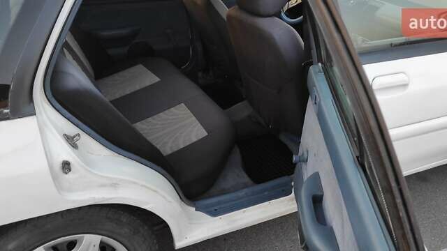 Белый Форд Эскорт, объемом двигателя 1.9 л и пробегом 259 тыс. км за 1500 $, фото 11 на Automoto.ua