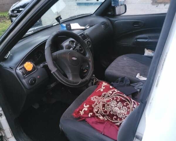 Білий Форд Ескорт, об'ємом двигуна 1.39 л та пробігом 275 тис. км за 1700 $, фото 6 на Automoto.ua