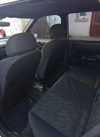 Білий Форд Ескорт, об'ємом двигуна 1.3 л та пробігом 230 тис. км за 1200 $, фото 3 на Automoto.ua