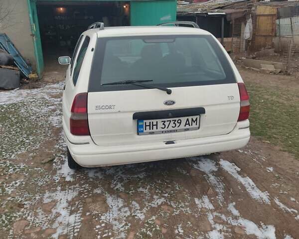 Білий Форд Ескорт, об'ємом двигуна 1.8 л та пробігом 300 тис. км за 700 $, фото 4 на Automoto.ua