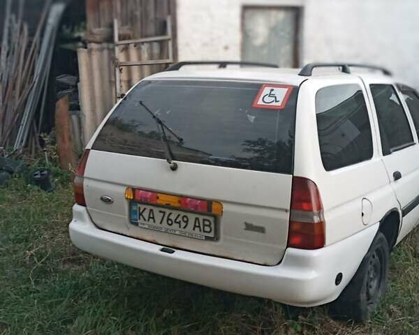 Белый Форд Эскорт, объемом двигателя 1.3 л и пробегом 320 тыс. км за 1100 $, фото 2 на Automoto.ua