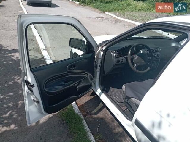 Белый Форд Эскорт, объемом двигателя 0 л и пробегом 214 тыс. км за 1900 $, фото 3 на Automoto.ua