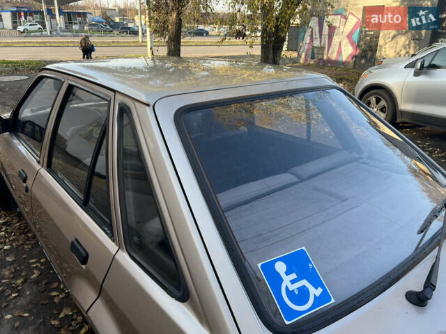 Бежевий Форд Ескорт, об'ємом двигуна 1.4 л та пробігом 150 тис. км за 880 $, фото 5 на Automoto.ua